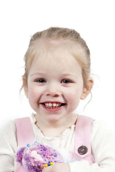 Entzückendes kleines Mädchen mit Spielzeug — Stockfoto