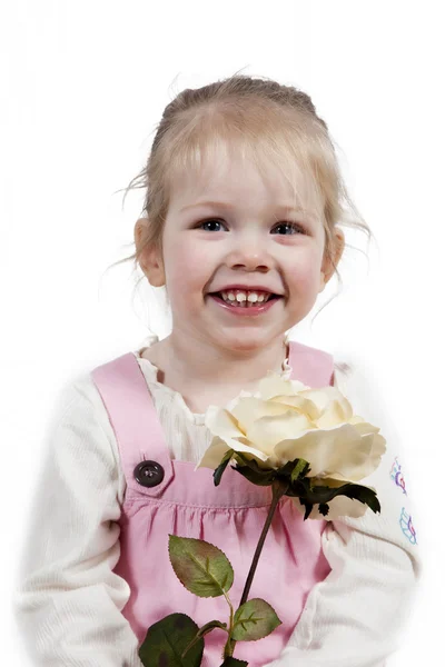 Adorable little girl with rose — Stock Photo, Image