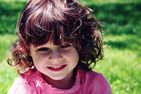 Little girl looking away outside — Stock Photo, Image