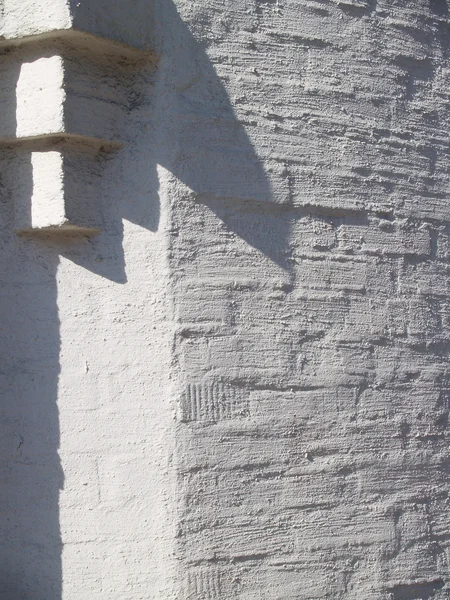Plastered bricks sunlit — Stock Photo, Image