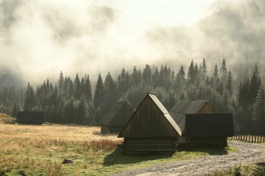 Huts along the trail in the Carpathian Mountains clipart