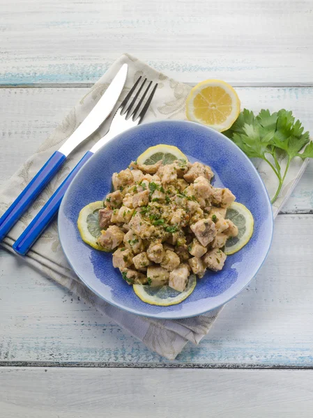 Swordfish with artichoke and parsley — Stock Photo, Image