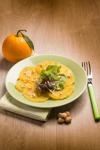 Orange carpaccio salad with hazelnut — Stock Photo, Image