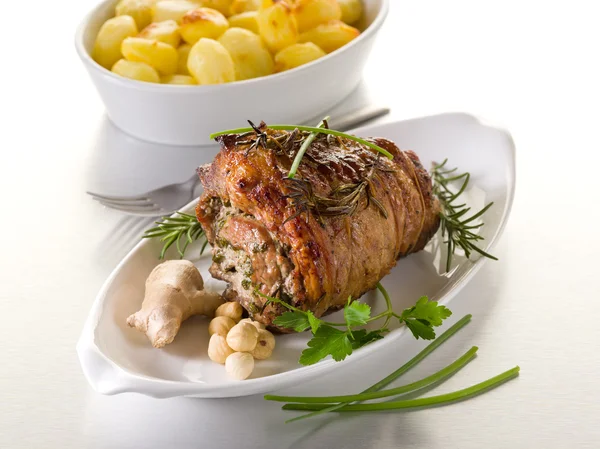 Whole rolled veal stuffed with nuts, ginger and parsley — Stock Photo, Image