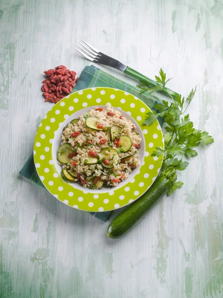 Risotto with zucchinis and goji berries — Stock Photo, Image