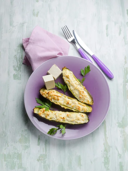 Zucchinis stuffed with tofu cheese, vegetarian food — Stock Photo, Image