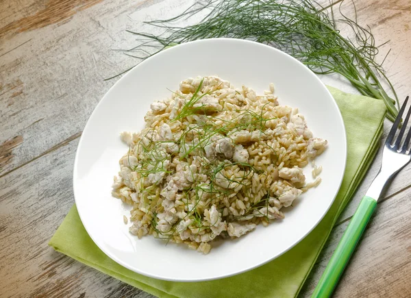 Risotto med fiskfilé och söt fänkål — Stockfoto