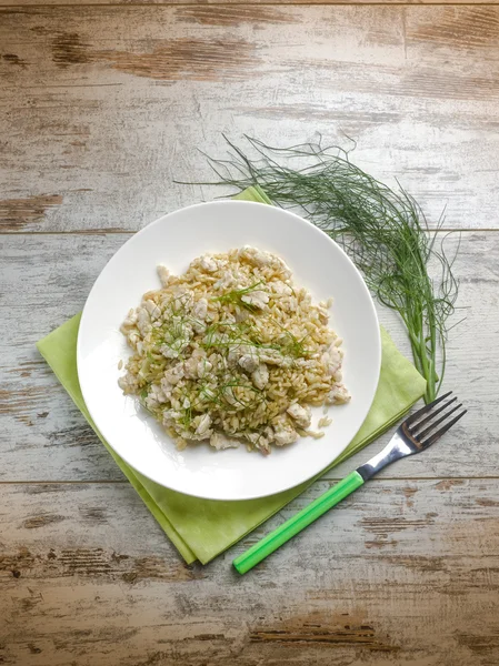 Risotto with fish fillet  and sweet fennel — Stock Photo, Image