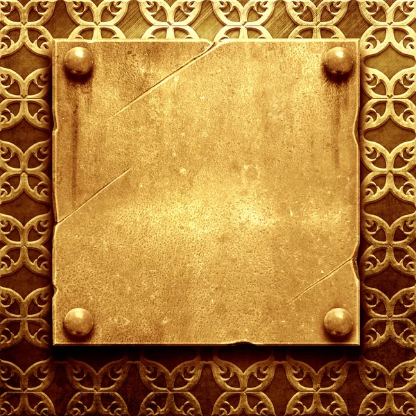 Zlatá kovová deska s klasickým ornament — Stock fotografie