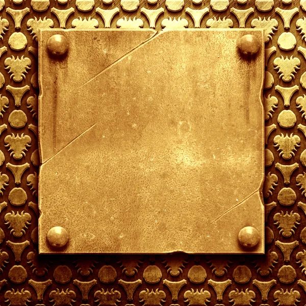 Placa de metal dourado com ornamento clássico — Fotografia de Stock