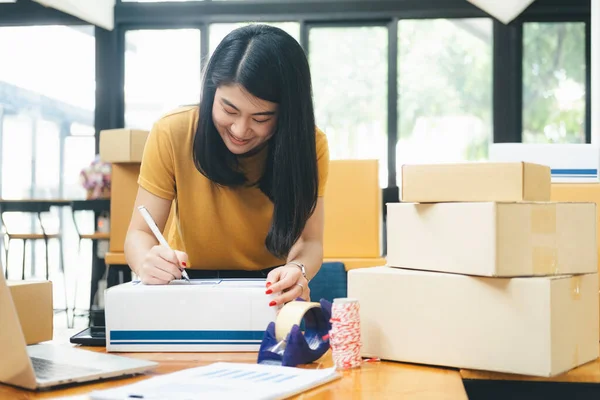 Closeup Hand Young Woman Writing Address Parcel Box Delivery Order — Stock Photo, Image