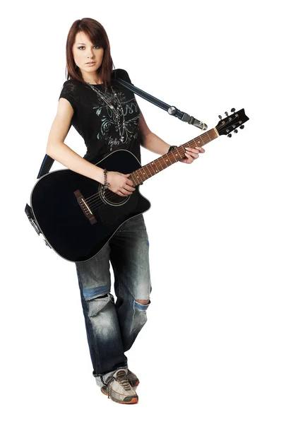Adolescente menina tocando uma guitarra acústica — Fotografia de Stock
