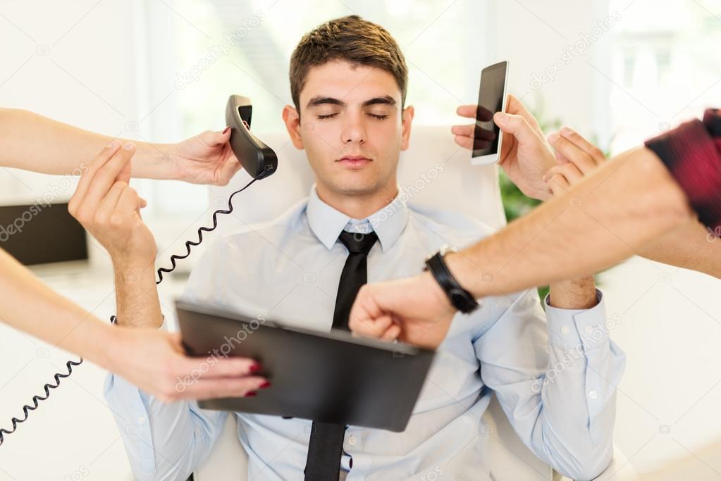 Young Businessman Meditating