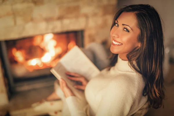 Enjoying By The Fireplace — Stock Photo, Image