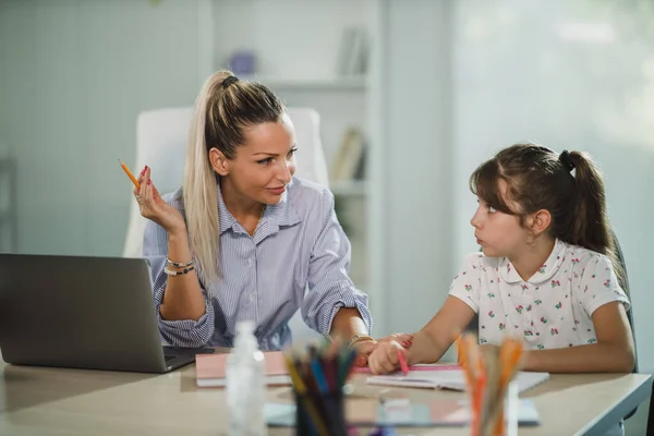 Beautiful Young Mother Helping Her Cute Daughter Homework Home — Stock Photo, Image