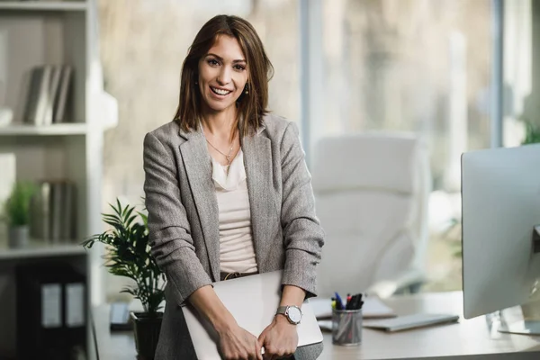 Successful Young Business Woman Holding Laptop Standing Her Office Looking — Stock Photo, Image