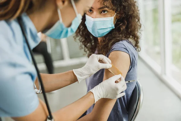 Nurse Applying Band Aid African American Girl Receiving Vaccine Due — Stock Photo, Image