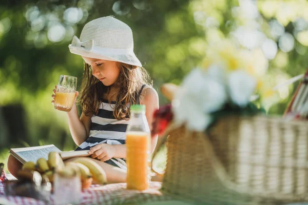 Cute Little Girl Spending Spring Day Nature Reading Book Picnic — Stock Photo, Image