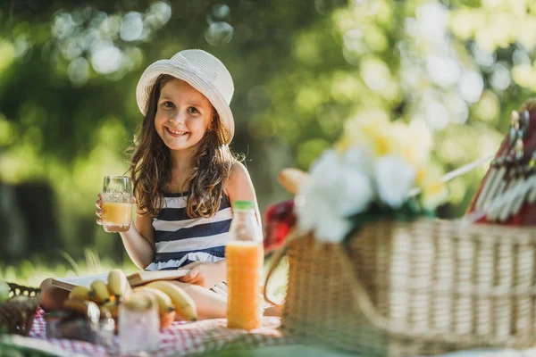 Cute Smiling Little Girl Spending Spring Day Nature Drinking Orange — Stock Photo, Image