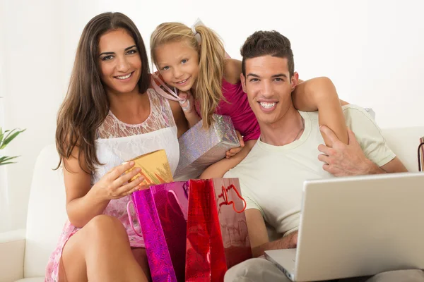 Happy family having online shopping — Stock Photo, Image