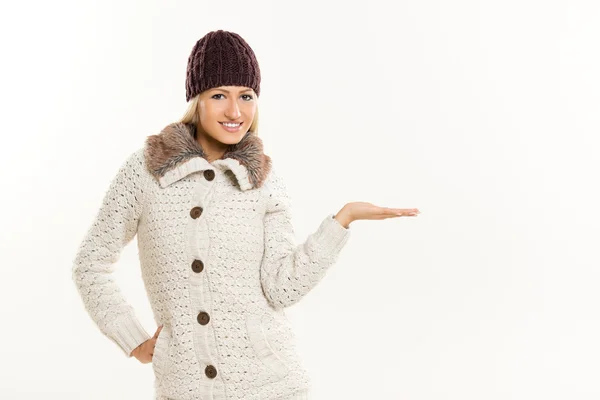 Blonde Girl In Winter Clothes, With Outstretched Palm — Stock Photo, Image