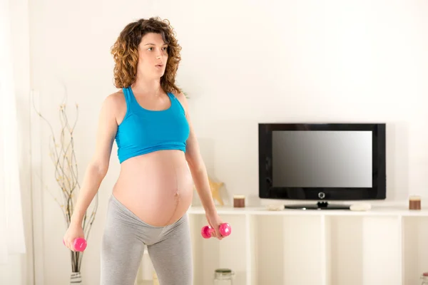 Zwangere vrouwen doen ademhalingsoefeningen Rechtenvrije Stockfoto's