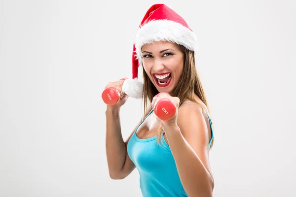Christmas fitness kvinna — Stockfoto