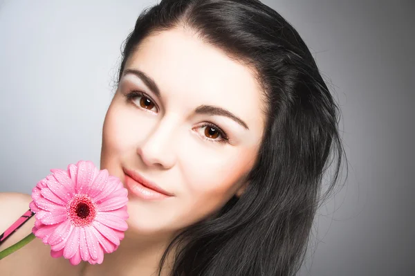 Woman with flowers Royalty Free Stock Photos