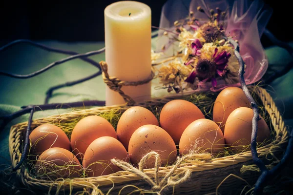 Easter composition Easter eggs candle Mystical light — Stock Photo, Image