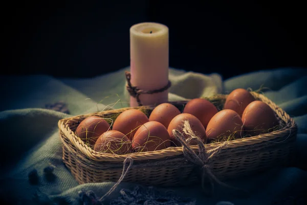 Easter composition Easter eggs candle Mystical light — Stock Photo, Image