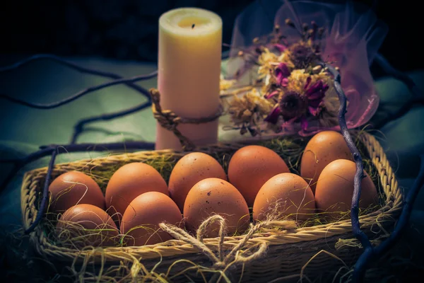 Easter composition Easter eggs candle Mystical light — Stock Photo, Image