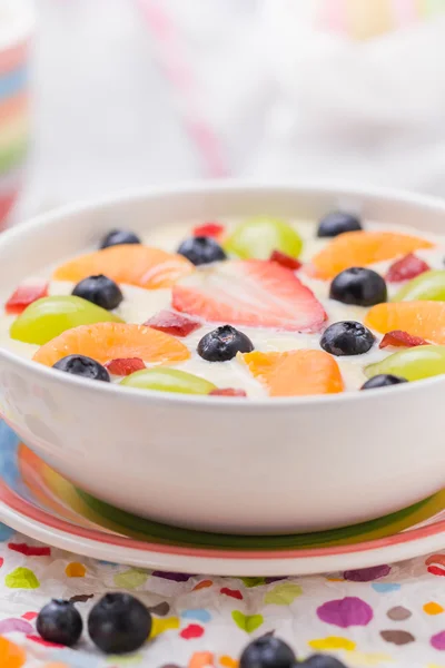 Delicious milky vanilla pudding colorful fruit — Stock Photo, Image