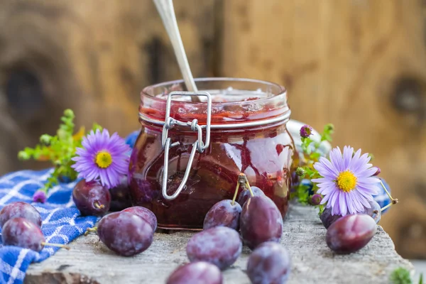Late summer kitchen jar plum jam — Stock Photo, Image