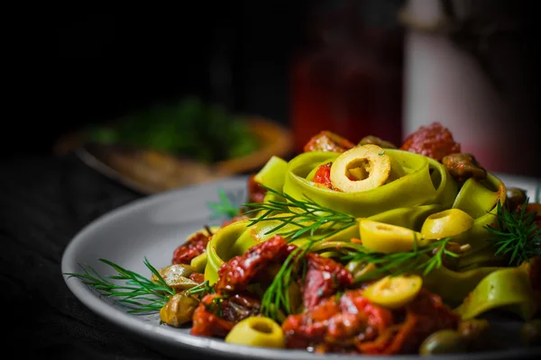 Warm lunch Pasta tomato sauce capers asparagus Magic light — Stock Photo, Image