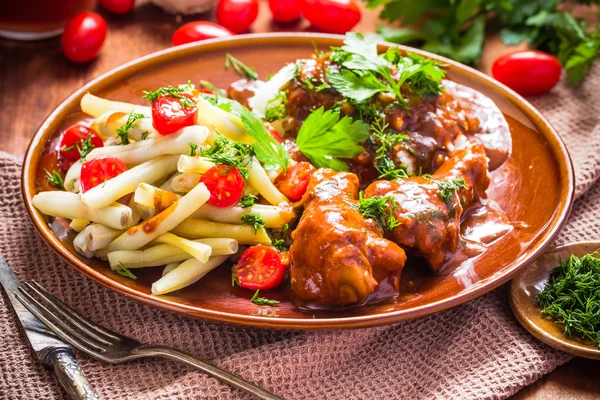 Chicken in tomato sauce with rice and green beans — Stock Photo, Image