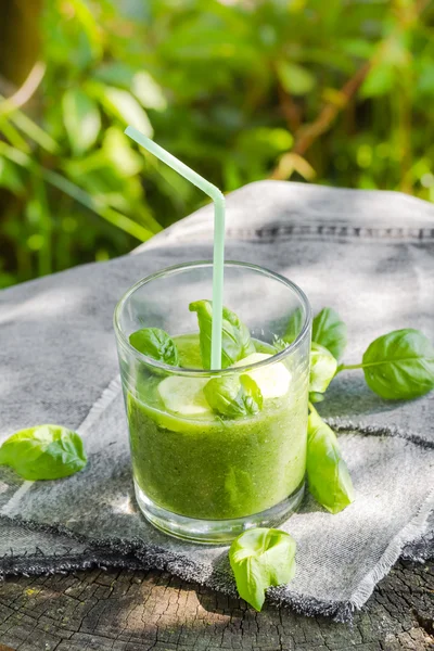 Green smoothie fresh cucumbers celery basil — Stock Photo, Image