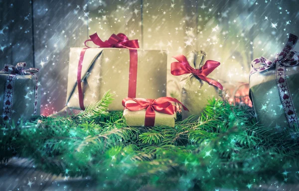 Holidays coming snowing Christmas gifts needles — Stock Photo, Image