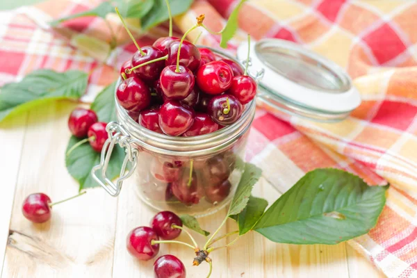 Summer fruits closeup cherries jar processed — Stock Photo, Image