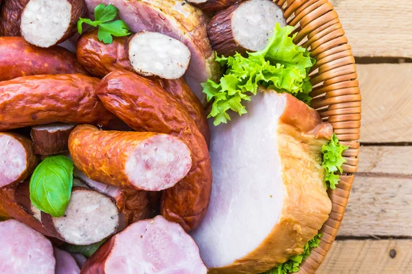 Background basket meat sausages meats — Stock Photo, Image