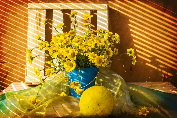 Still life bunch small yellow florets melon — Stock Photo, Image