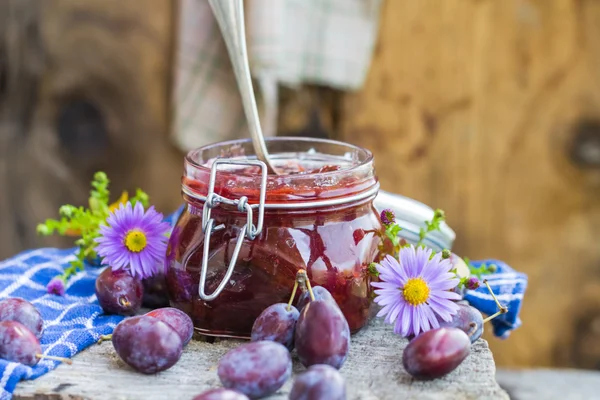 Late summer kitchen jar plum jam — Stock Photo, Image