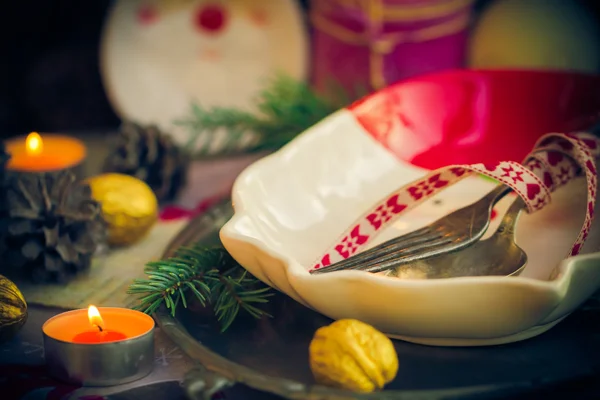 Festively decorated Christmas table tableware candles mood — Stock Photo, Image