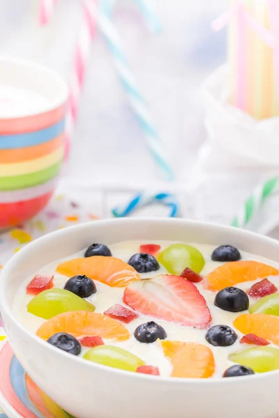 Colorful spring dessert vanilla pudding fruit — Stock Photo, Image