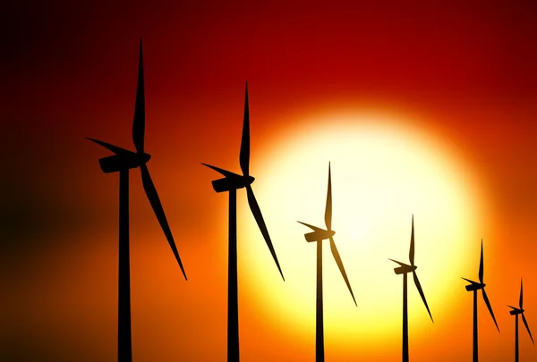 Wind turbine at sunset background — Stock Photo, Image