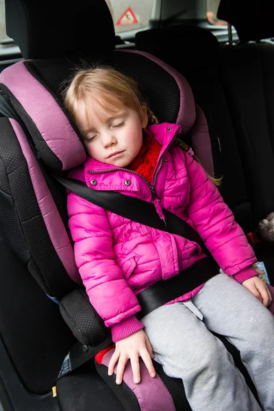 Little girl in a car seat — Stock Photo, Image