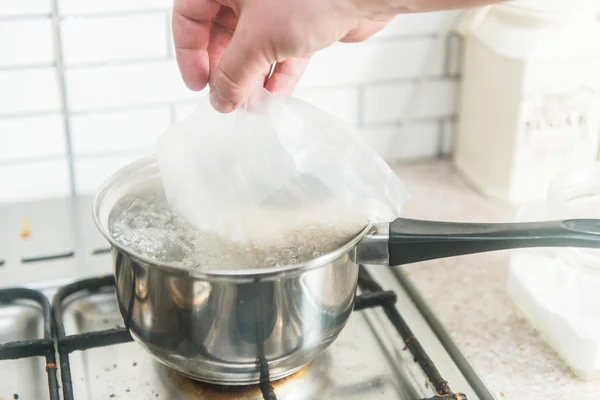 Arroz e água fervente — Fotografia de Stock