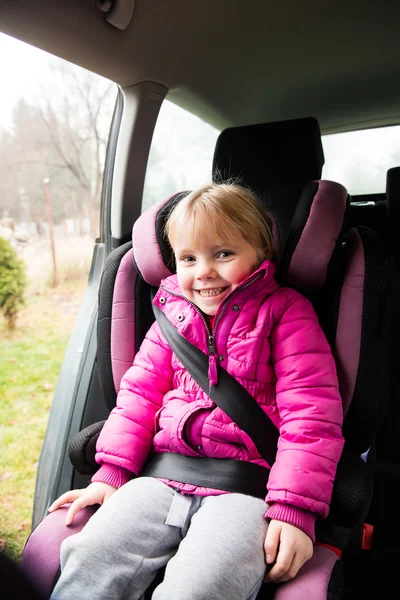 Little girl in a car seat — Stock Photo, Image