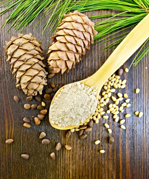 Flour cedar in spoon on board top — Stock Photo, Image