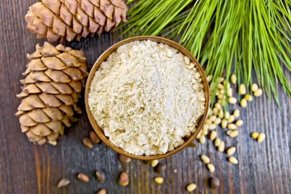Flour cedar in wooden bowl on board top — Stock Photo, Image