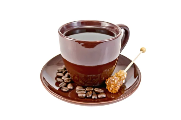 Кофе в коричневой чашке с сахаром и зерном — стоковое фото